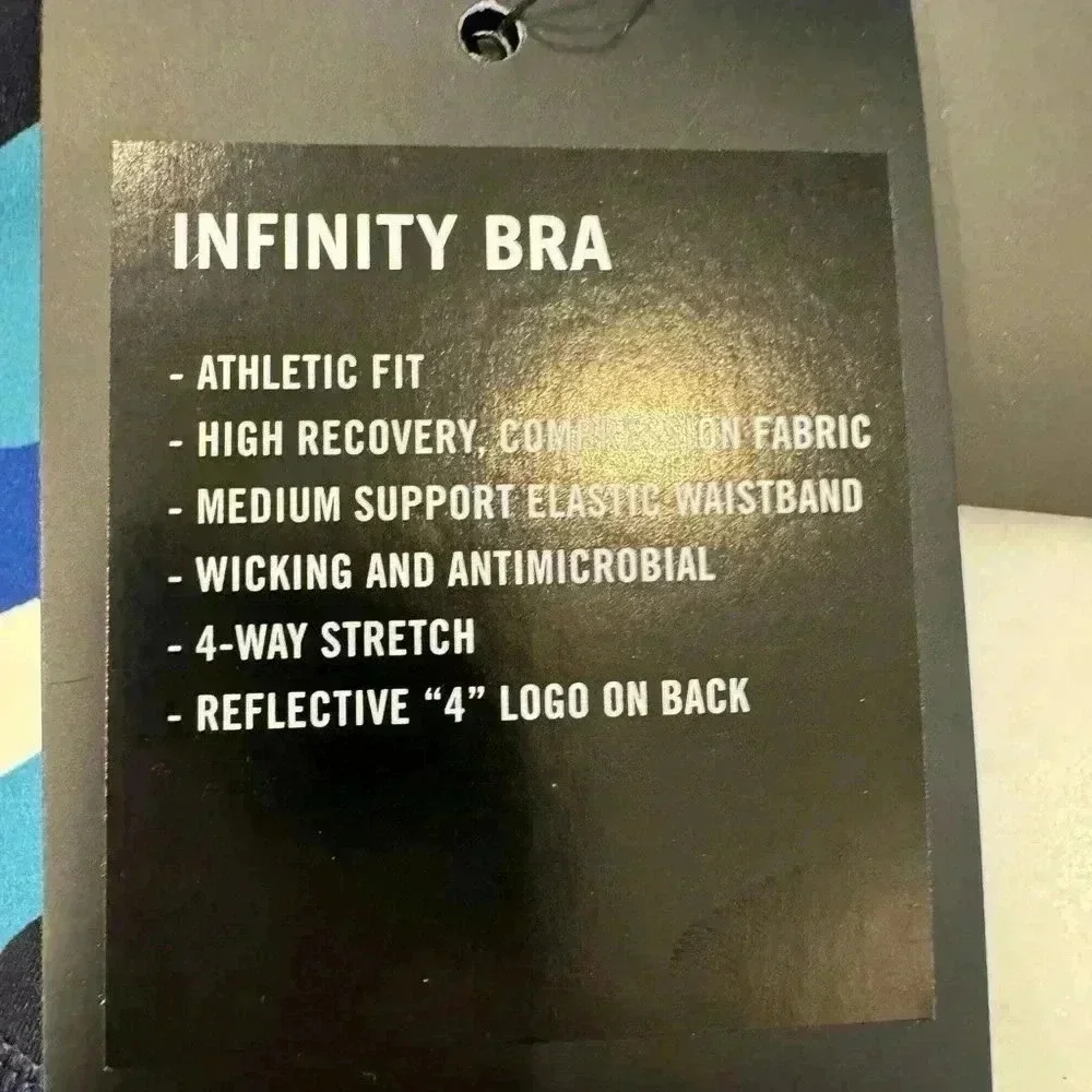 Fourlaps infinity sports bra teal, black & white camo racer back size medium